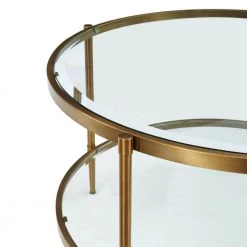 32 in. Clear/Gold Medium Round Glass Coffee Table with Storage Shelf by Boyel Living 14 32 in. Clear/Gold Medium Round Glass Coffee Table with Storage Shelf by Boyel Living -MODWAY store gold boyel living coffee tables ct 1353r 1f 1000