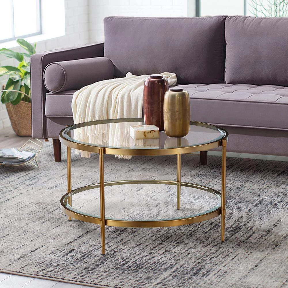 32 in. Clear/Gold Medium Round Glass Coffee Table with Storage Shelf by Boyel Living 4 32 in. Clear/Gold Medium Round Glass Coffee Table with Storage Shelf by Boyel Living - Image 2