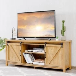 58 in. Golden TV Stand Fits TVs Up to 60 in with Cabinet Sliding Barn Door by Boyel Living -MODWAY store golden boyel living tv stands hysn 61826oa 31 1000